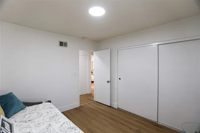 a bathroom with a double vanity sink and mirror