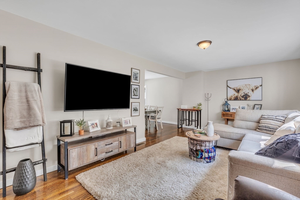 336 Taylor Road Enfield, CT 06082 - Photo 12 of 30 a living room with furniture and a flat screen tv