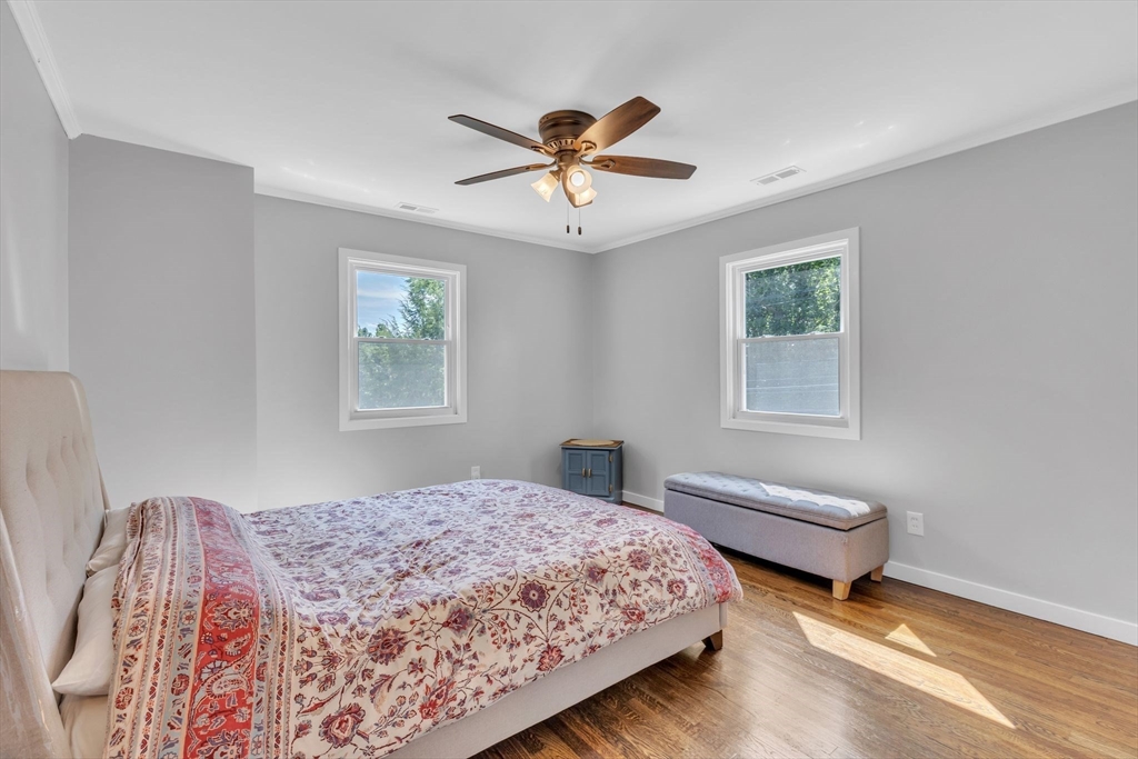 336 Taylor Road Enfield, CT 06082 - Photo 23 of 30 a spacious bedroom with a bed and a window