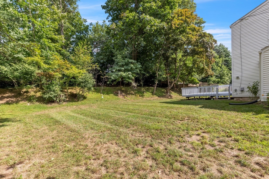 336 Taylor Road Enfield, CT 06082 - Photo 28 of 30 a view of a fountain in front of a house