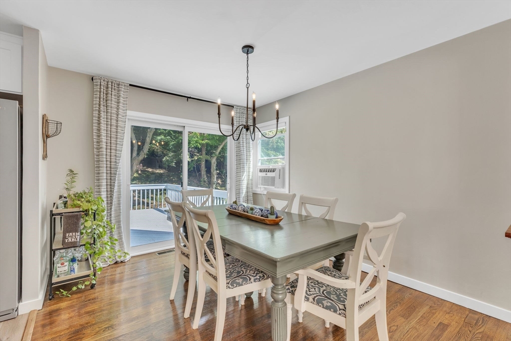 336 Taylor Road Enfield, CT 06082 - Photo 9 of 30 a view of a dining room with furniture window and wooden floor