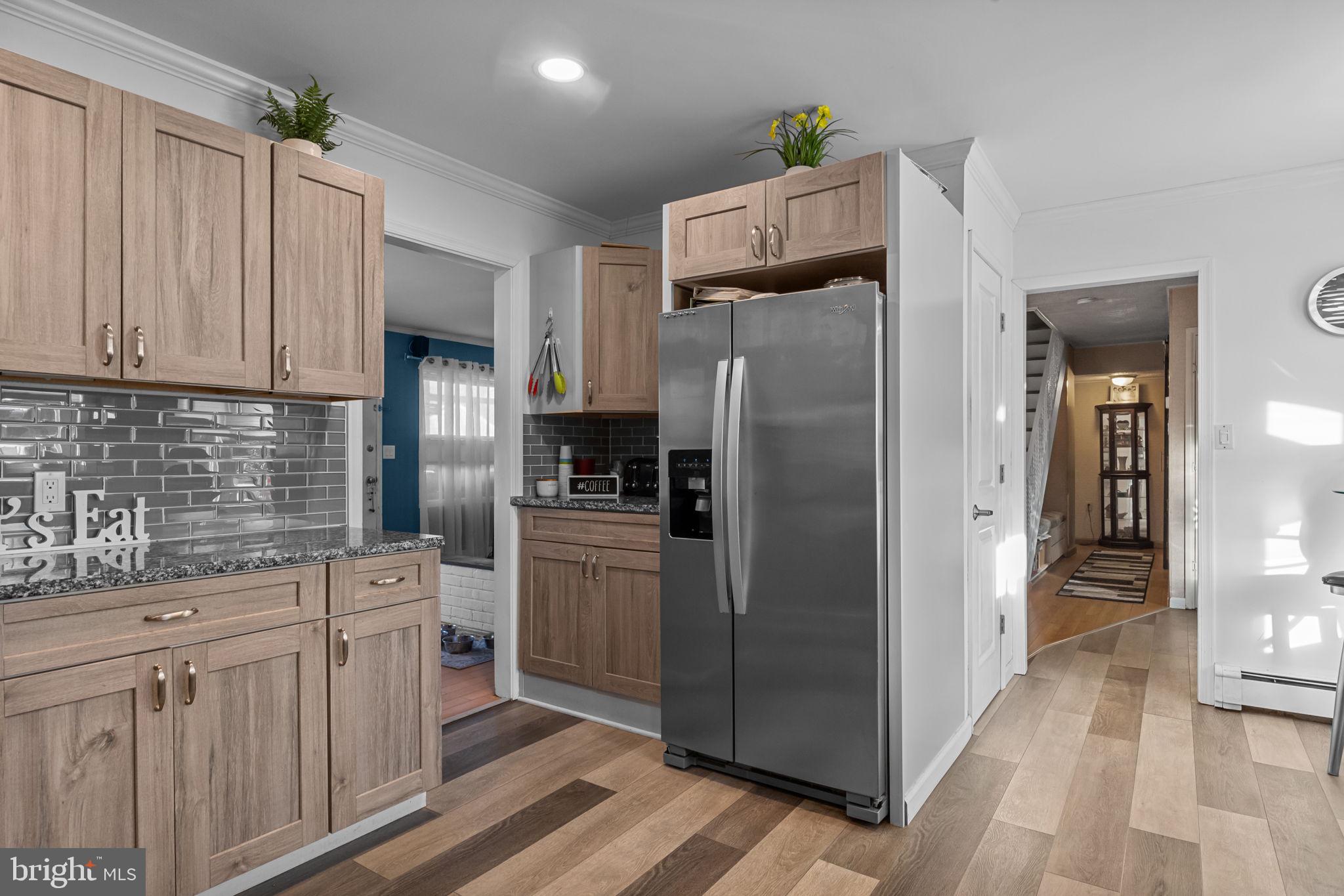 55 Rose Apple Road Levittown, PA 19056 - Photo 14 of 40 a kitchen with stainless steel appliances a refrigerator and a sink