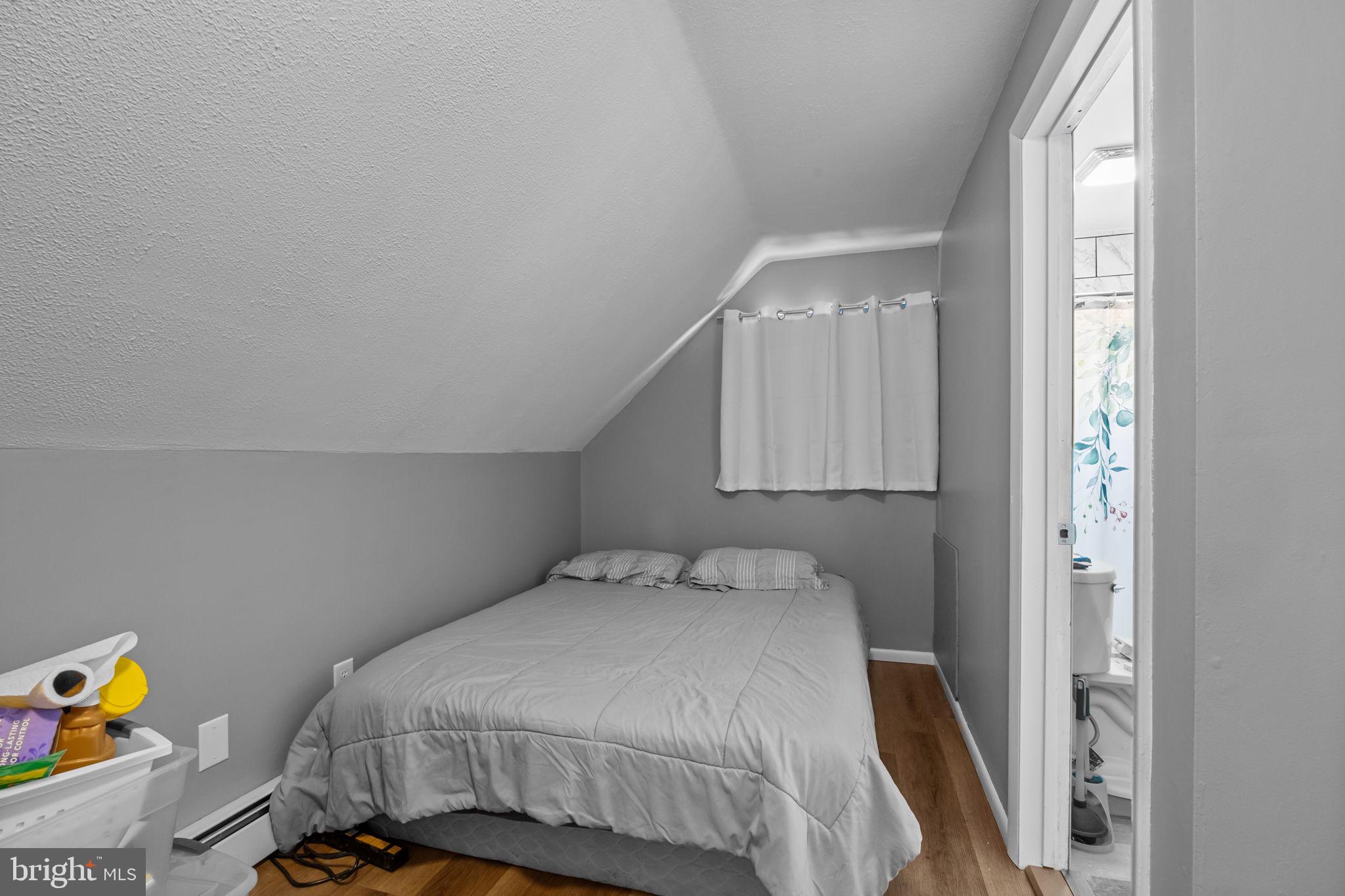 55 Rose Apple Road Levittown, PA 19056 - Photo 25 of 40 a bedroom with a bed and a window