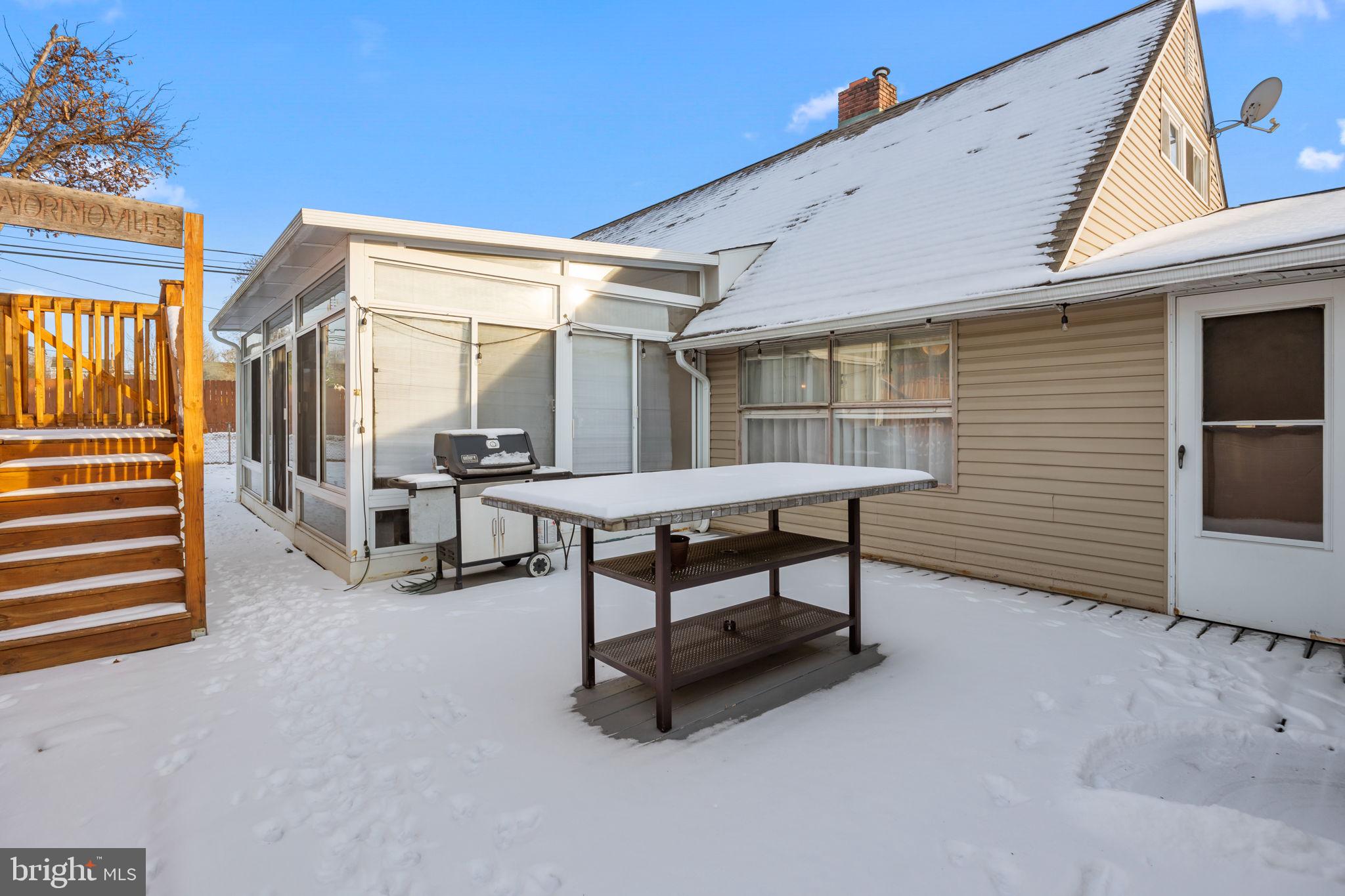 55 Rose Apple Road Levittown, PA 19056 - Photo 34 of 40 a roof deck with table and chairs