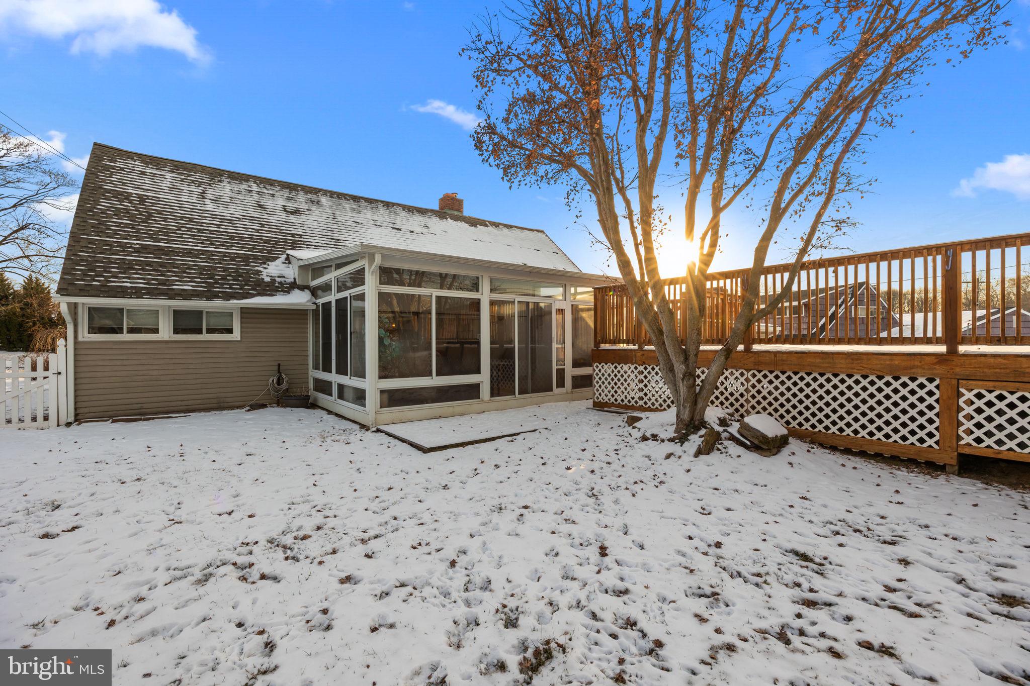 55 Rose Apple Road Levittown, PA 19056 - Photo 36 of 40 a view of a house with a snow in the yard