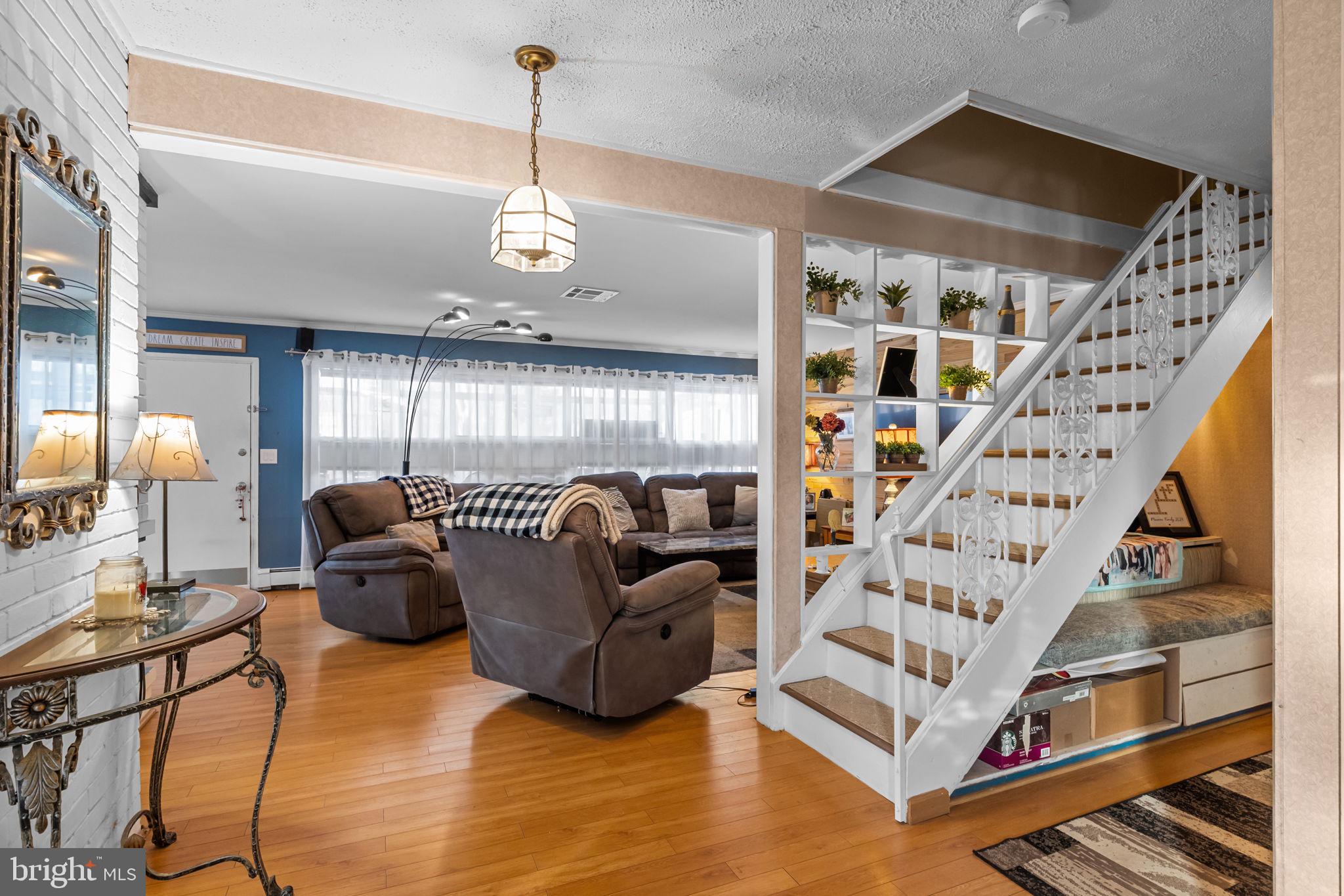 55 Rose Apple Road Levittown, PA 19056 - Photo 6 of 40 a view of livingroom with furniture and staircase