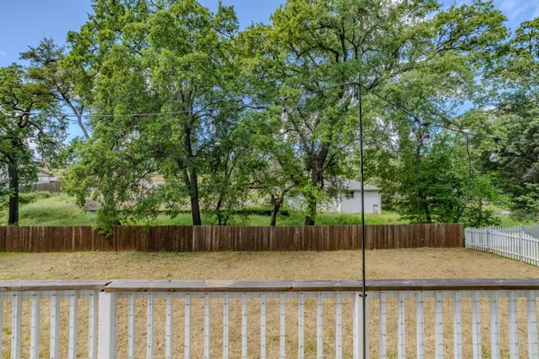 a view of backyard with green space
