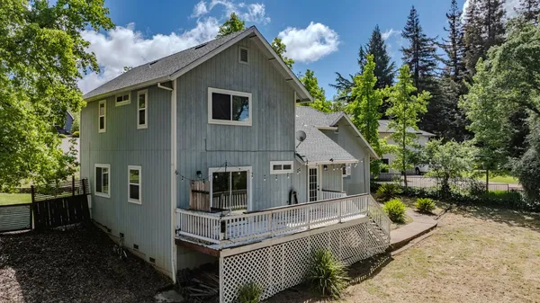 a house with trees in front of it