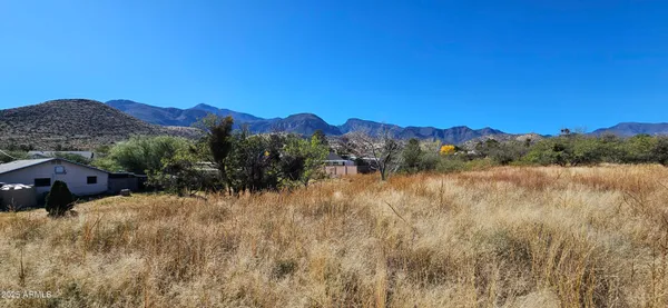 a view of a lake with mountains in the background