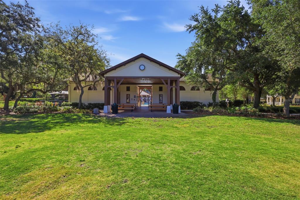 907 Pawstand Road Celebration, FL 34747 - Photo 40 of 49 a front view of a house with garden