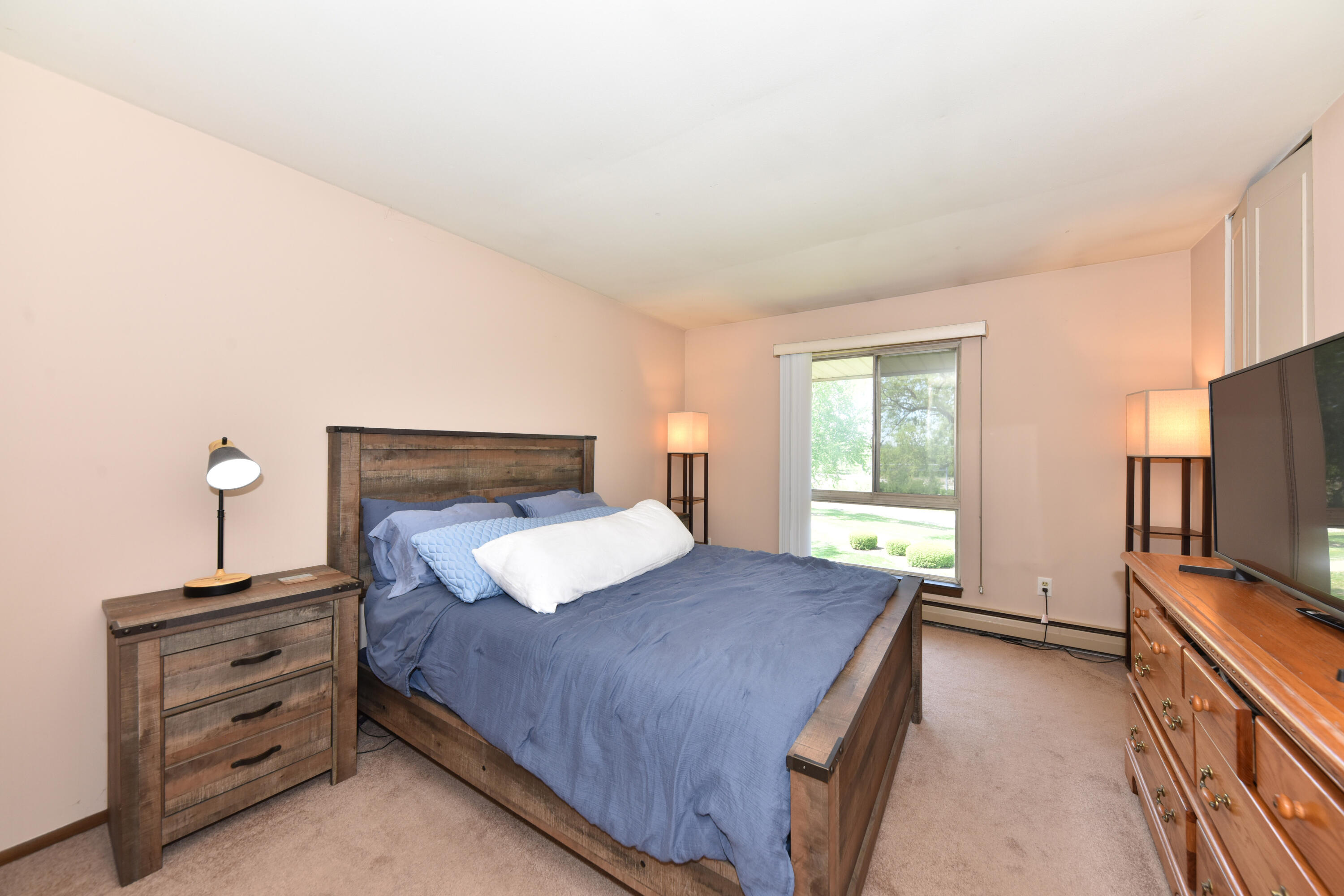 11907 West Appleton Avenue, Unit 20 Milwaukee, WI 53225 - Photo 12 of 44 Primary Bedroom