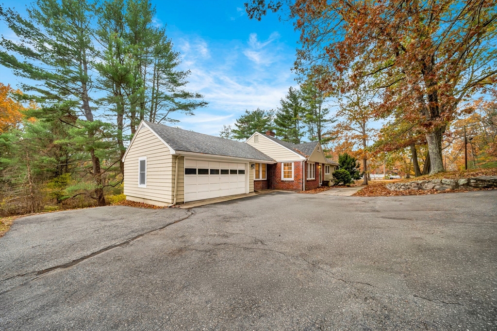 11 Gould Road Andover, MA 01810 - Photo 27 of 31 a view of a house with a yard and garage