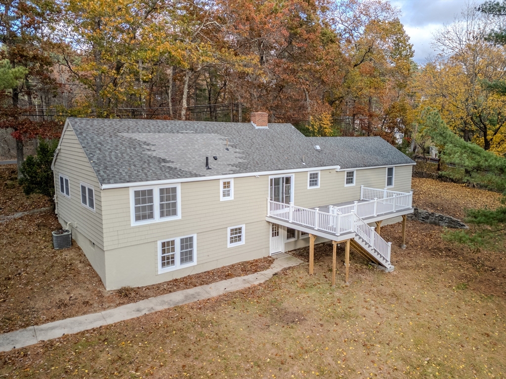 11 Gould Road Andover, MA 01810 - Photo 29 of 31 an aerial view of a house with table and chairs