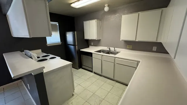 a utility room with washer and dryer