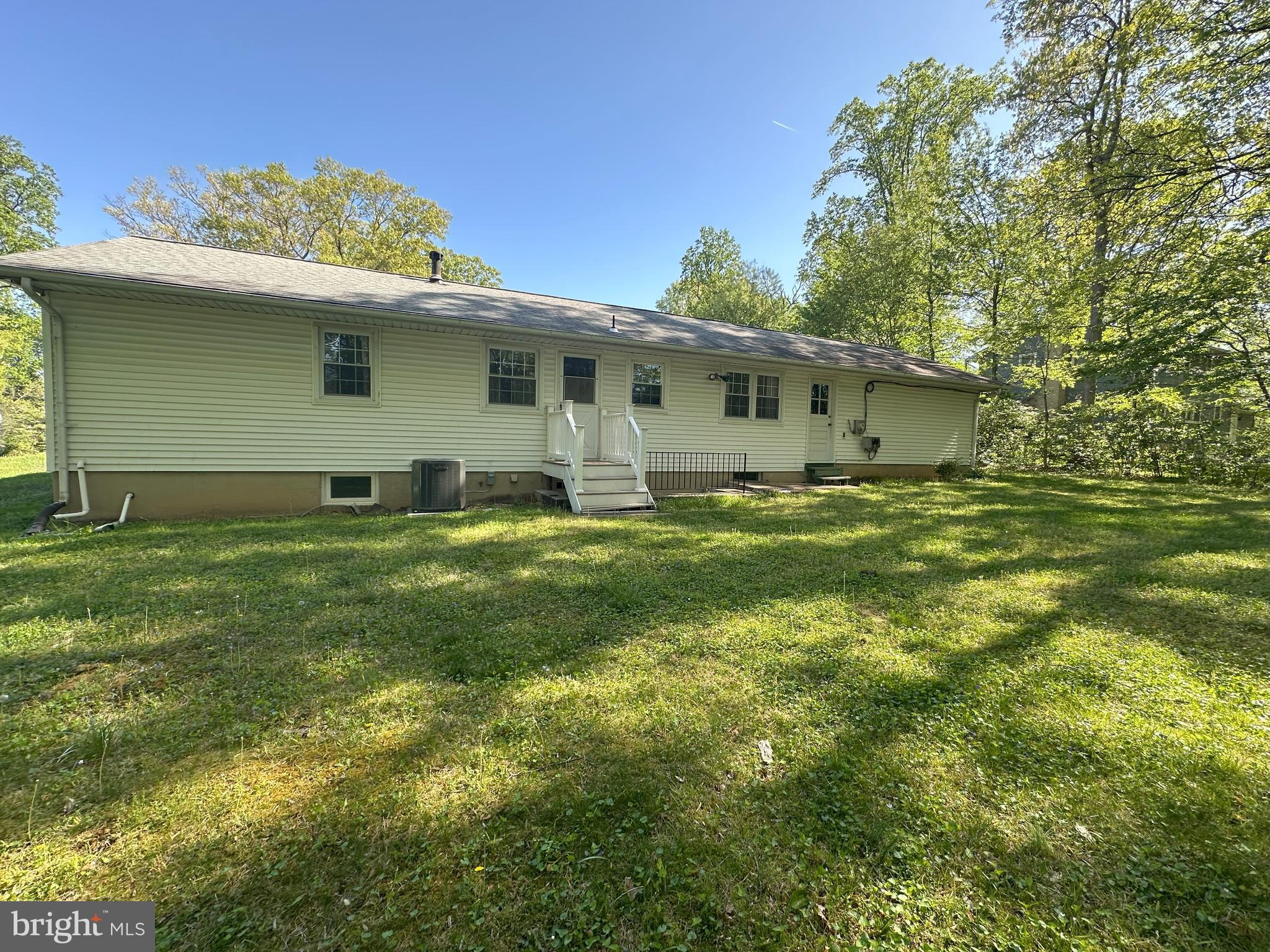 10621 Graeloch Road Laurel, MD 20723 - Photo 2 of 4 a view of a house with a yard