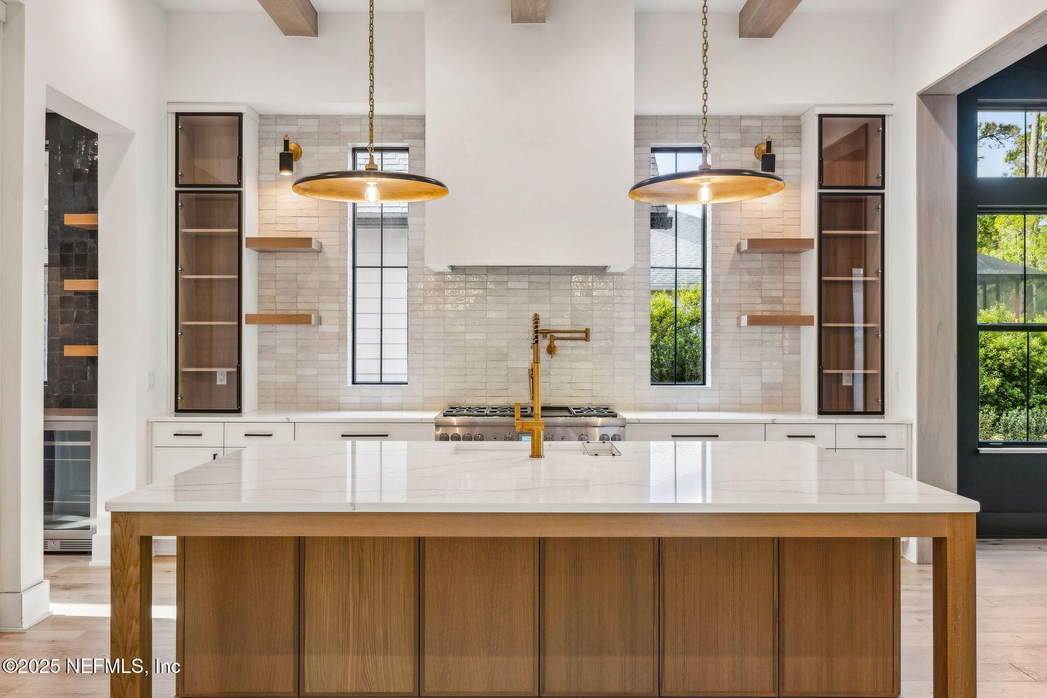 4650 Palm Valley Road Ponte Vedra Beach, FL 32082 - Photo 15 of 80 a bathroom with a sink and a mirror