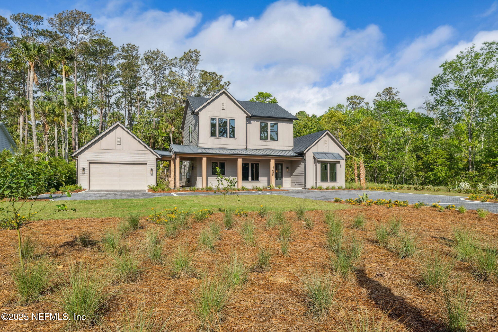 4650 Palm Valley Road Ponte Vedra Beach, FL 32082 - Photo 2 of 80 a front view of a house with garden