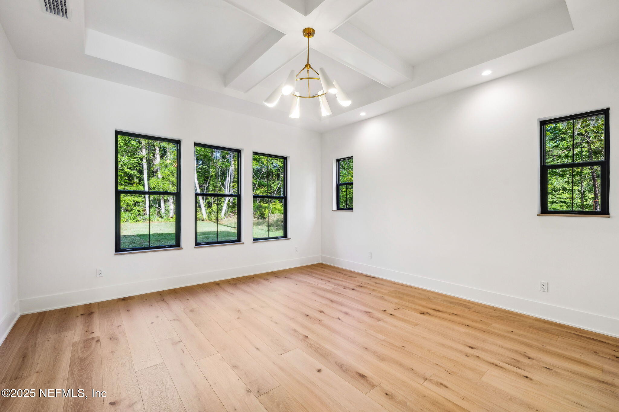 4650 Palm Valley Road Ponte Vedra Beach, FL 32082 - Photo 29 of 80 a view of an empty room with wooden floor and a window