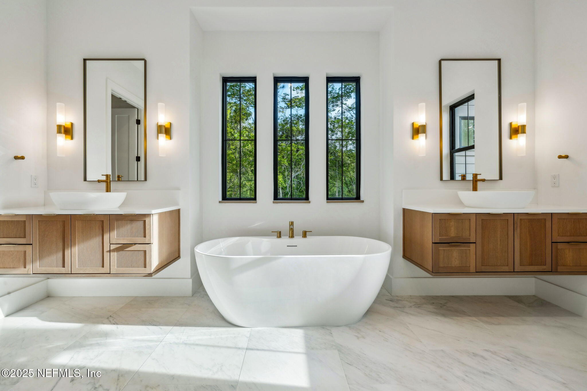 4650 Palm Valley Road Ponte Vedra Beach, FL 32082 - Photo 34 of 80 a spacious bathroom with a tub sink and mirror