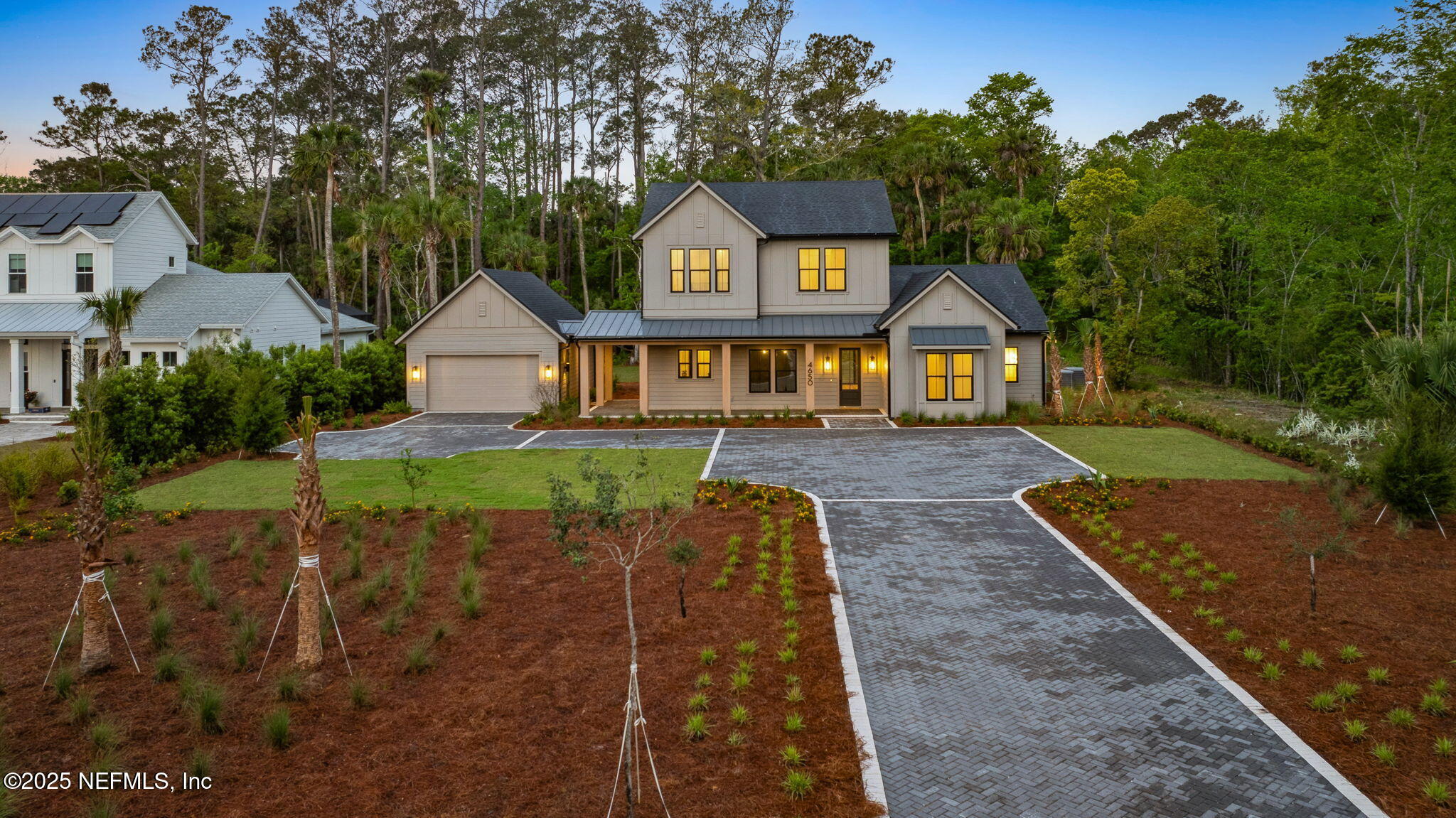 4650 Palm Valley Road Ponte Vedra Beach, FL 32082 - Photo 68 of 80 a front view of a house with garden