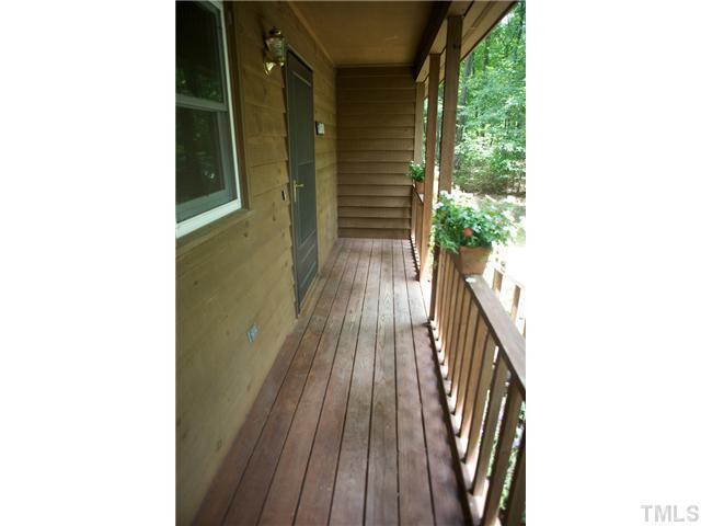 6410 Amed Road Bahama, NC 27503 - Photo 4 of 25 Sizable long porch at the entrance.