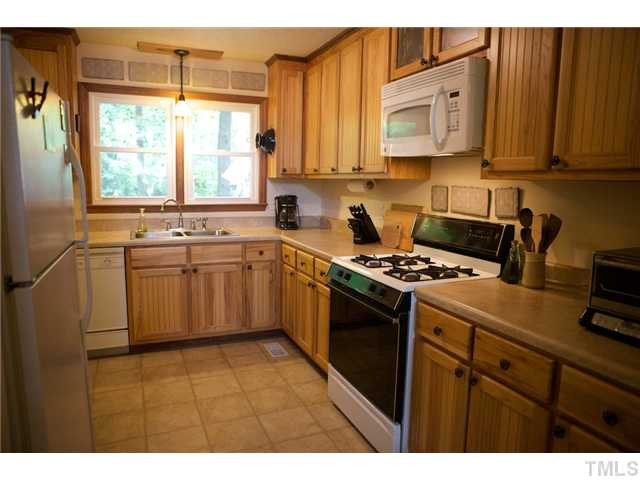 6410 Amed Road Bahama, NC 27503 - Photo 7 of 25 New Counters, Flooring and Cabinets.