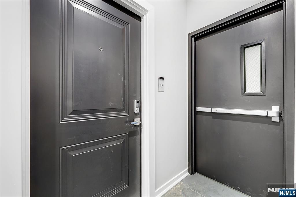 74 Clarendon Place, Unit 202 Hackensack, NJ 07601 - Photo 24 of 32 a view of an empty room