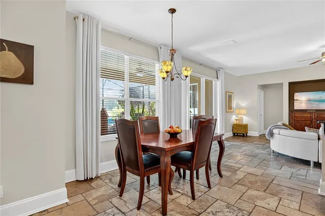 a view of a livingroom with furniture and window