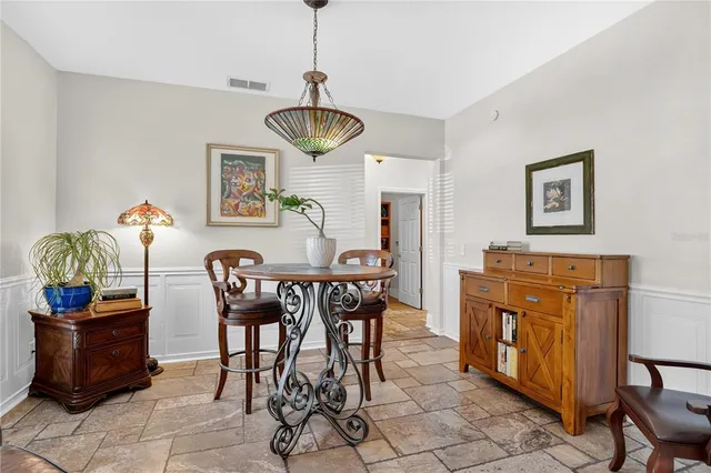 a view of a dining room with furniture