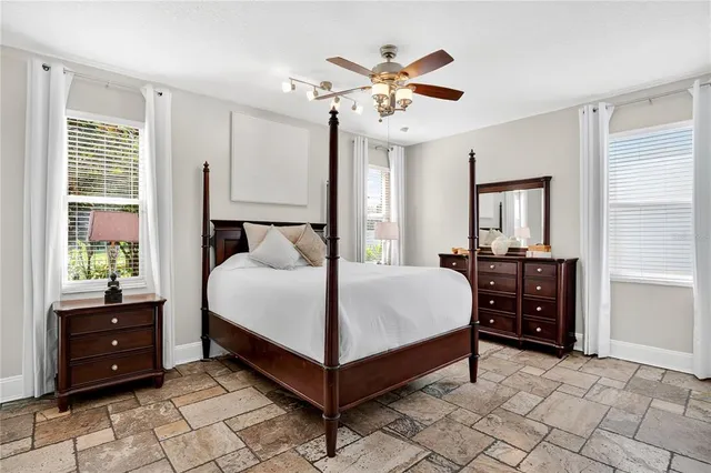 a bedroom with a bed and a dresser