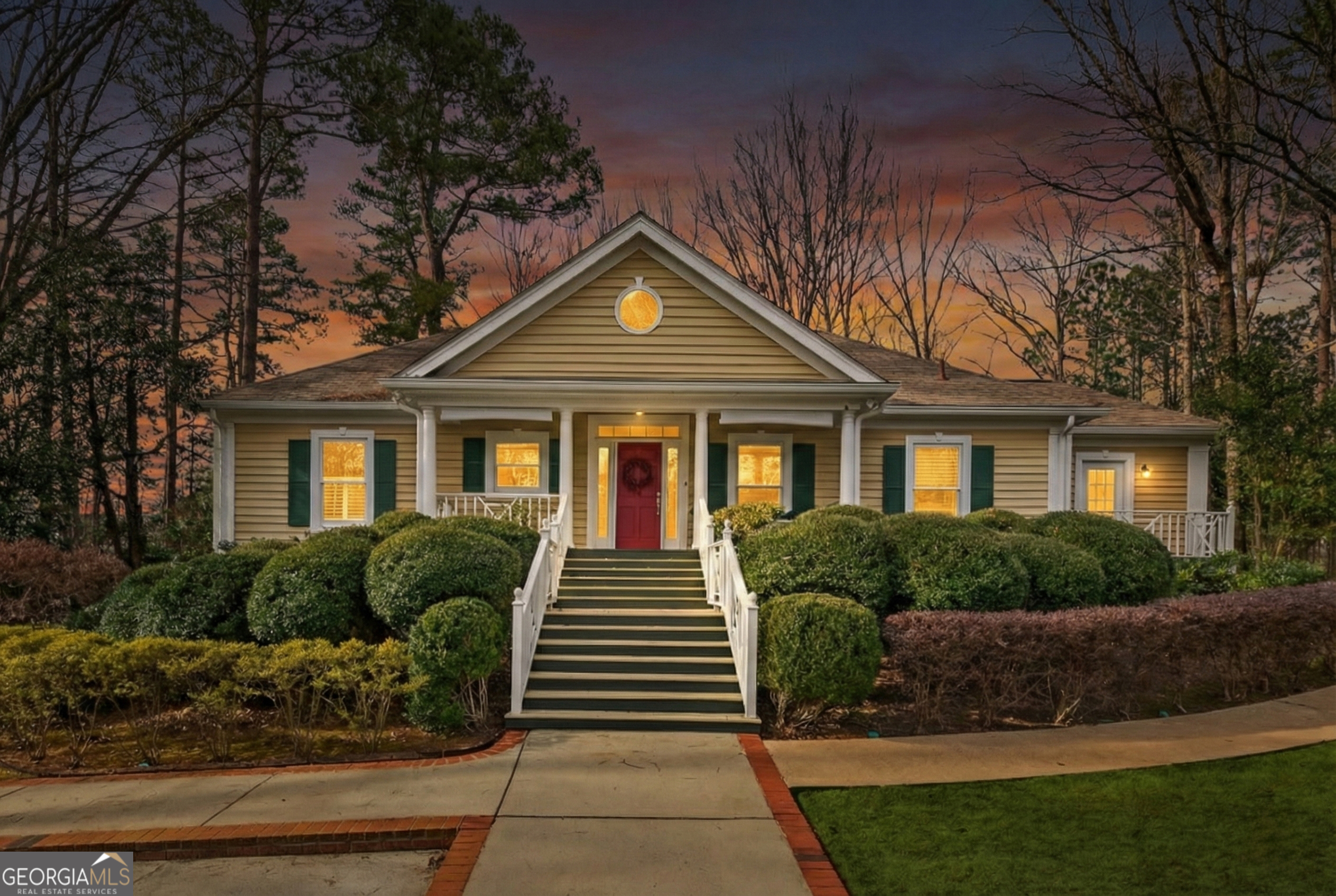 a front view of a house with a yard