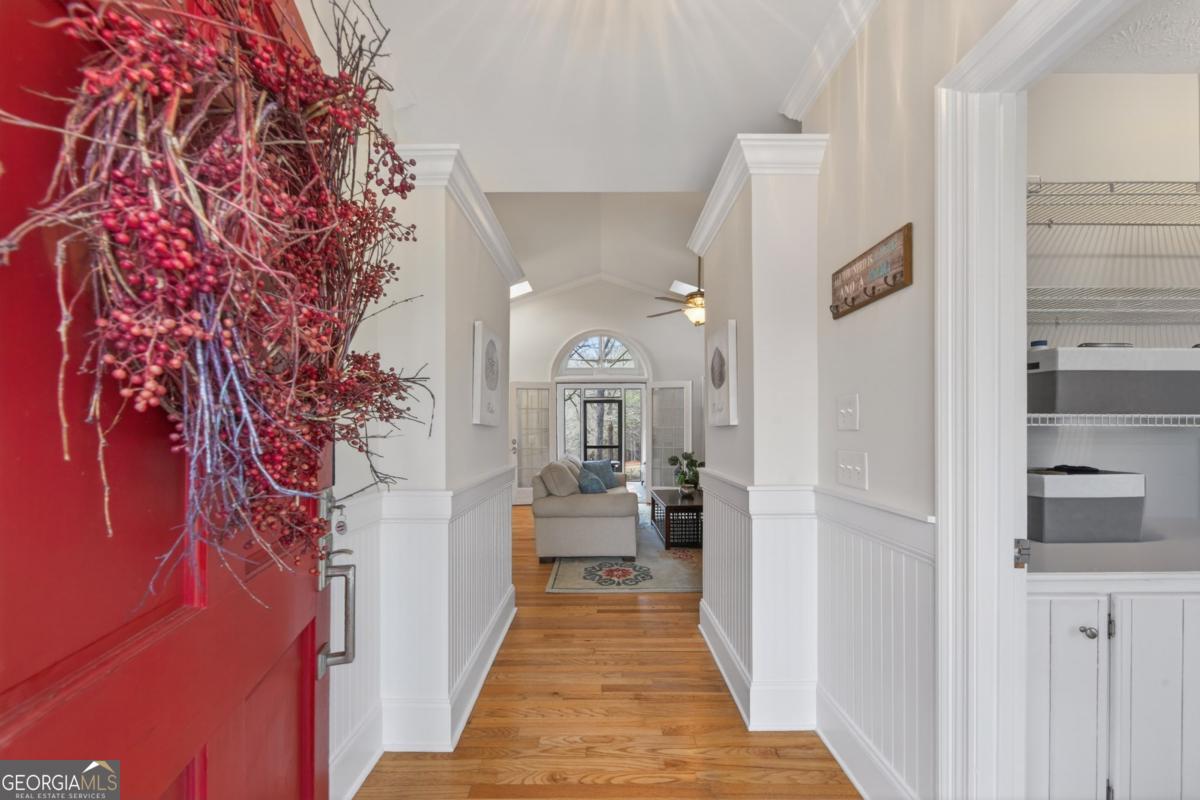 1091 Maple Ridge Way Greensboro, GA 30642 - Photo 14 of 52 a view of a bedroom from a hallway