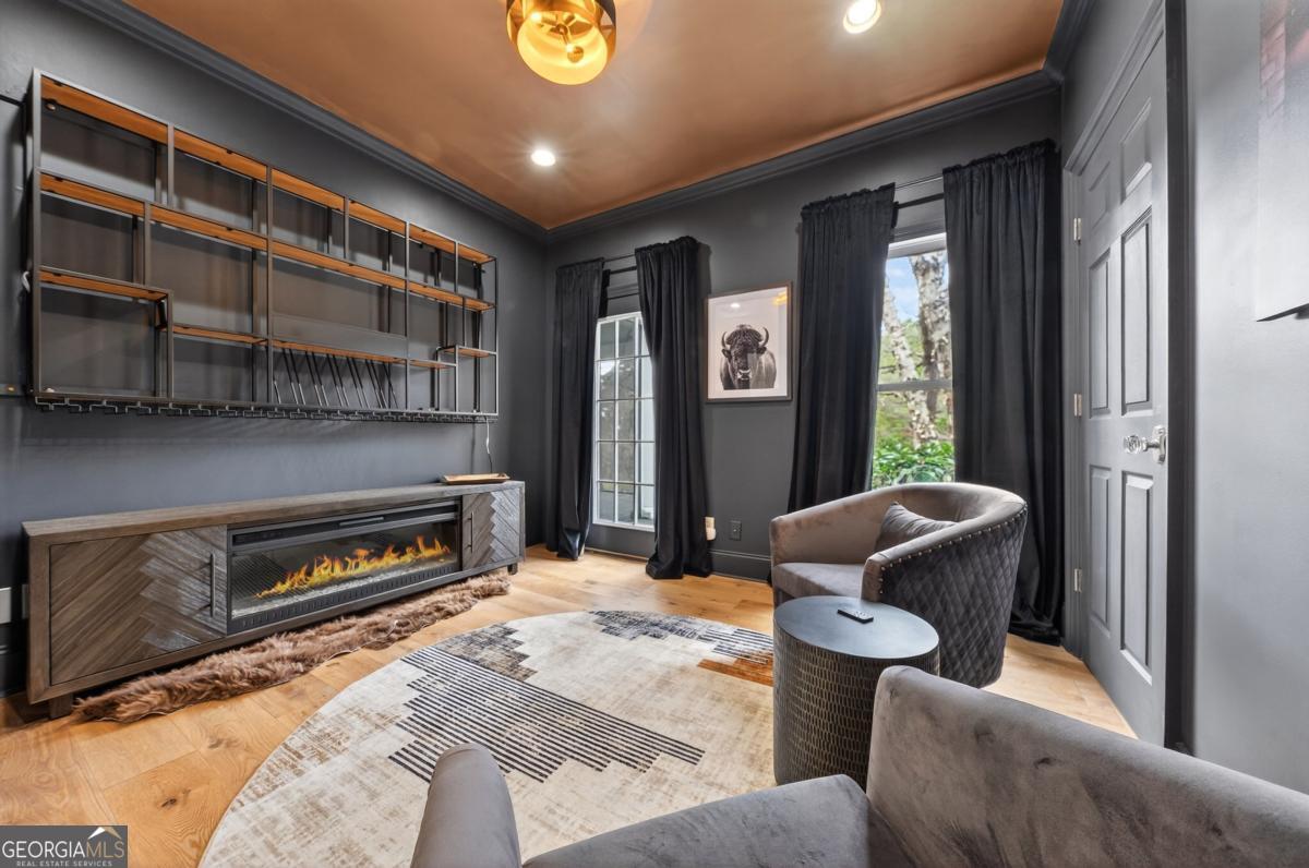 1091 Maple Ridge Way Greensboro, GA 30642 - Photo 30 of 52 a outdoor living space with furniture and a fireplace