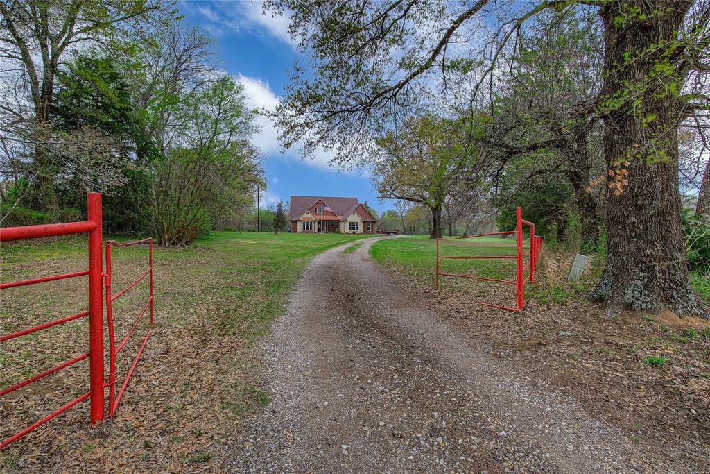 811 County Road 4250 Point, TX 75472 - Photo 1 of 38 Quiet country living with beautiful trees and open land.