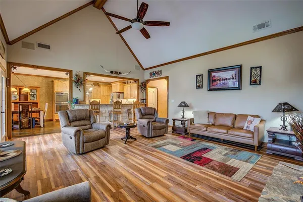 a living room with furniture and a rug