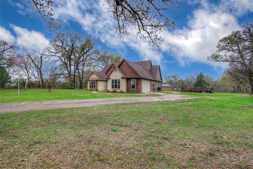 811 County Road 4250 Point, TX 75472 - Photo 6 of 38 Charming country setting with privacy and scenic surroundings.