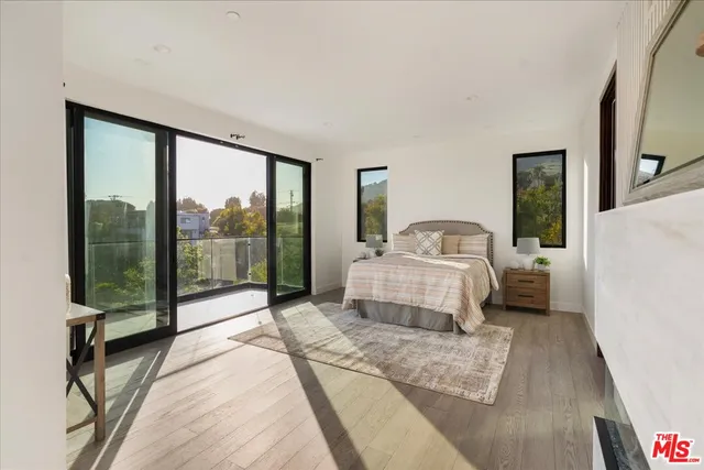 a bathroom with a tub and a window