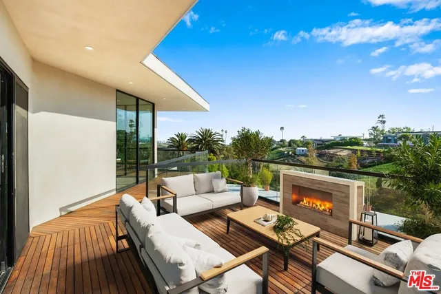 a view of a city with mountains in the background