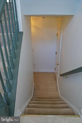 an empty room with closet area