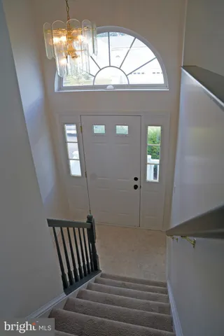 a kitchen with a sink and a microwave