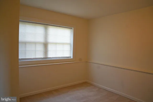 an empty room with closet
