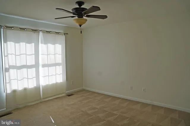 an empty room with a window