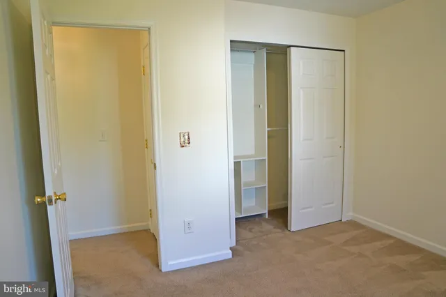 an empty room with closet