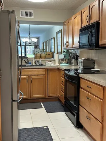 a view of a floor to ceiling window with an outdoor space