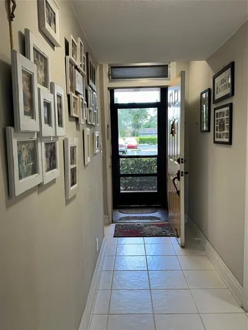 a view of a workspace with furniture