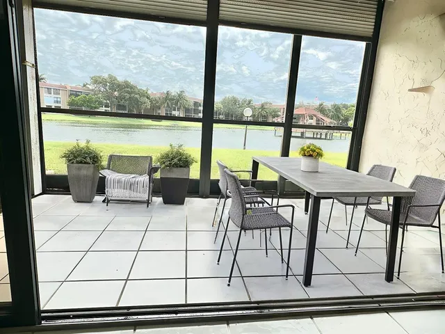 a view of a door with washer and dryer