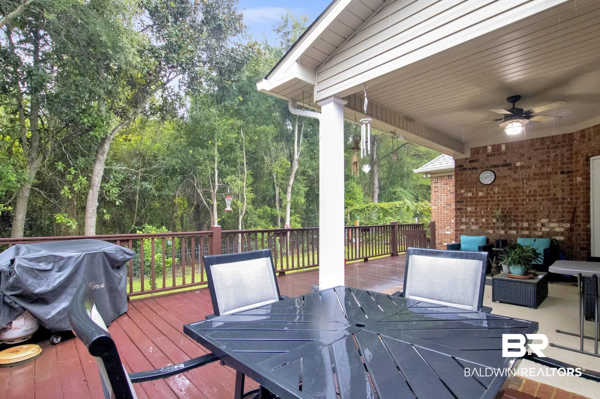 1 Bens Bluff Daphne, AL 36527 - Photo 46 of 56 Wooden terrace with a grill and ceiling fan