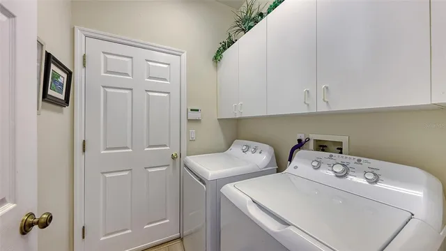 a view of a hallway with front door