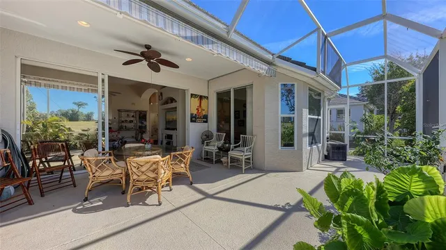 an aerial view of a house with garden space and street view
