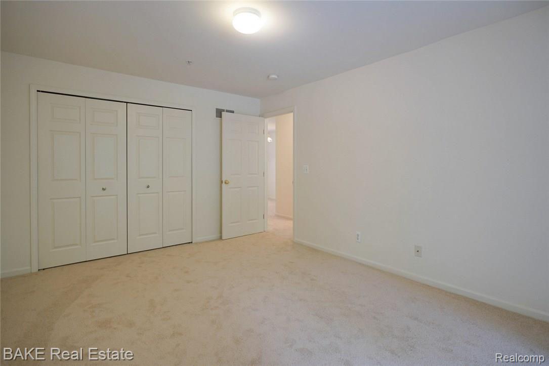 16954 Farmington Road, Unit 25 Livonia, MI 48154 - Photo 14 of 20 Master Bedroom & plentiful closets